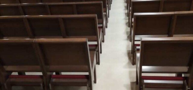 equally spaced church pews