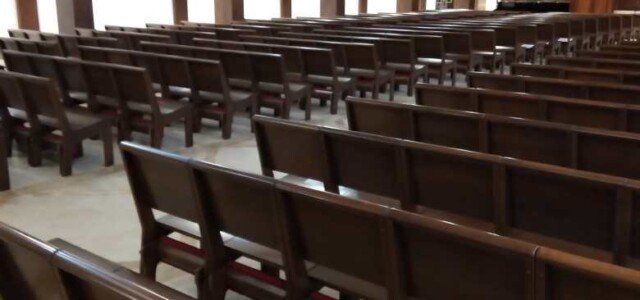 equally spaced church pews