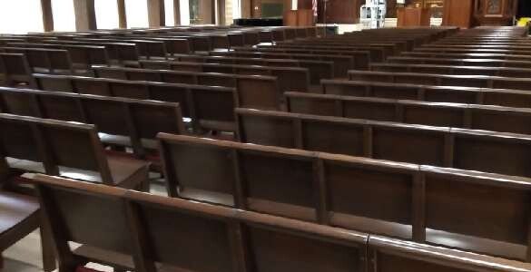 equally spaced church pews