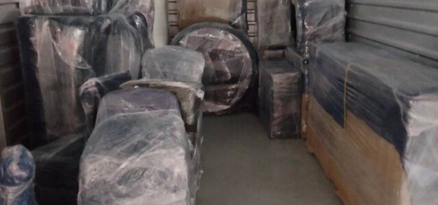 professional wrapped furniture in storage unit