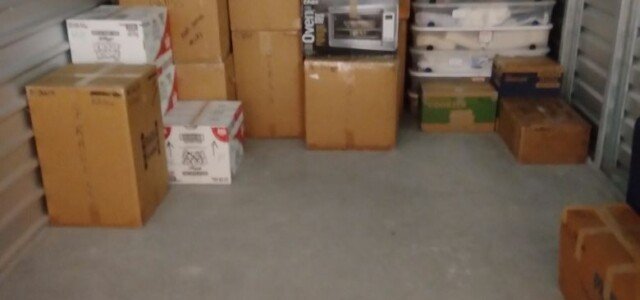 cardboard boxes in storage unit