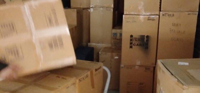 cardboard boxes in storage unit